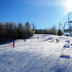 Ski lift on snowy trail